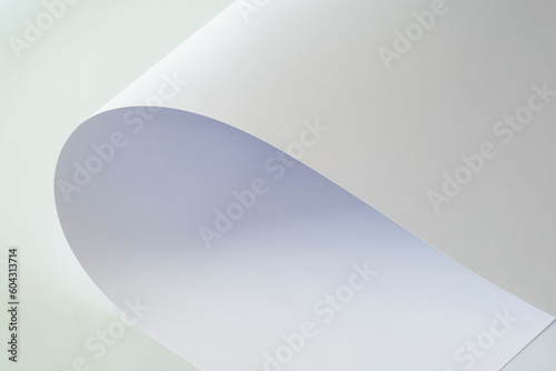 A large sheet of white paper on a light background.