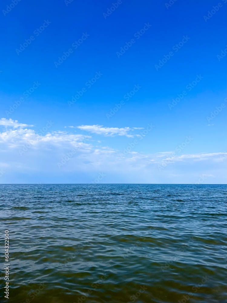 Transparent sea water, blue sea horizon, blue sky Transparent sea water, blue sea horizon, blue sky