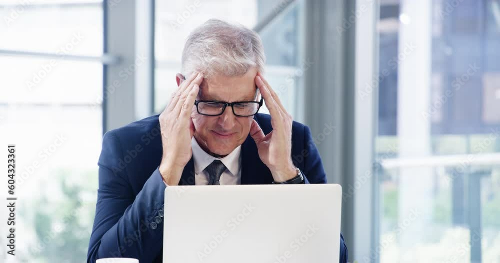 Headache, laptop and business man with pain, tired or fatigue in office. Migraine, sick and senior male person with stress, anxiety or vertigo, depression or problem, brain fog and burnout at work. Headache, laptop and business man with pain, tired or fatigue in office. Migraine, sick and senior male person with stress, anxiety or vertigo, depression or problem, brain fog and burnout at work.