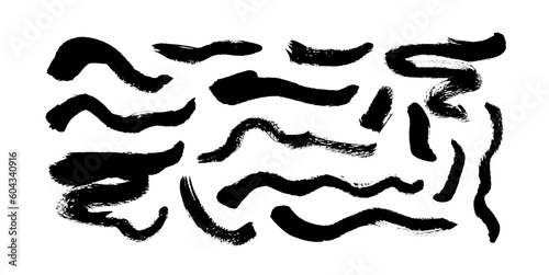Black paint wavy brush strokes vector collection. Curved bold brush strokes and thick lines. Modern grunge rough lines isolated on white background. Calligraphy vector smears. Black paint wavy smears.