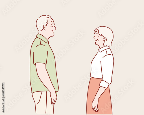 Elderly couple standing together. Grandfather with walking stick and grandmother. Hand drawn style vector design illustrations.