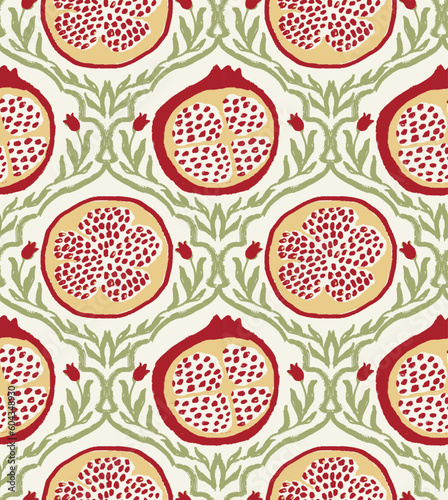 Seamless sweet pattern of pomegrante fruits among green vines and red flowers, showing cross section of pomegranate fruit with the jewel like seeds.  Great for clothing, accessories, wallpaper, home 