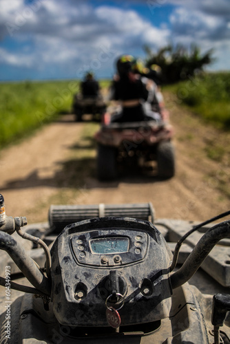 Quad bike in a field, atv motorcycle, sunny day