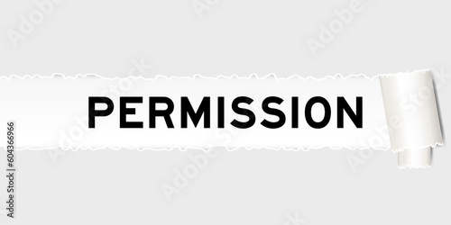 Ripped gray paper background that have word permission under torn part