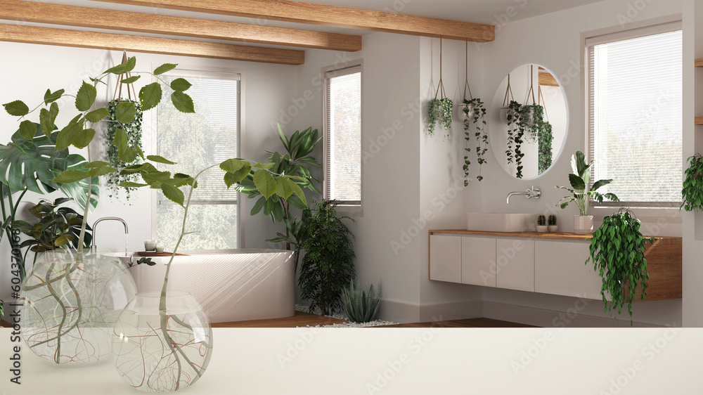 White table top or shelf with glass vase with hydroponic plant, ornament, root of plant in water, branch in vase, bathroom with bathtub and many houseplants, interior design