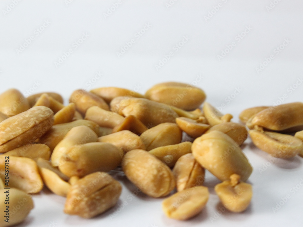peeled peanut on white background, close up view peeled peanut on white background, close up view