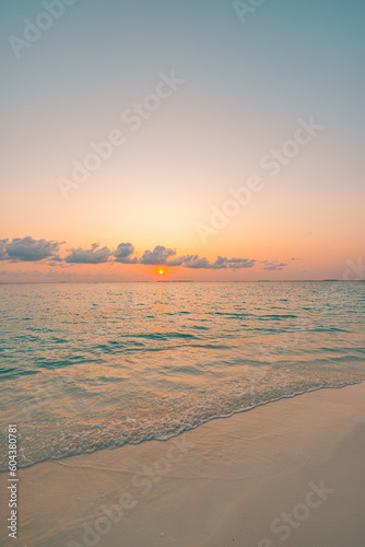 Sea sand sky closeup  sunset colors clouds horizon peaceful seascape panoramic banner. Inspirational beautiful nature  exotic travel landscape of tropical beach. Beach shore sunrise summer tranquility