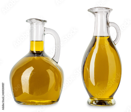 Extra virgin olive oil in glass cruet and in egyptian-style glass cruet isolated photo