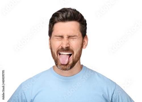 Man showing his tongue on white background