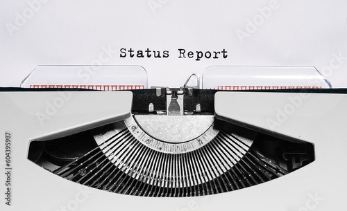 Text status report typed on retro typewriter photo