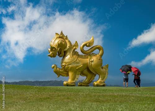 Singha statue at Singha Park. Tourists visiting the famous Singha statue. Northern Thailand s most beautiful travel destinations. Chiang rai. 