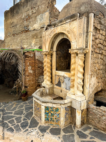 Old well in Casbah of Algiers, Algeria photo