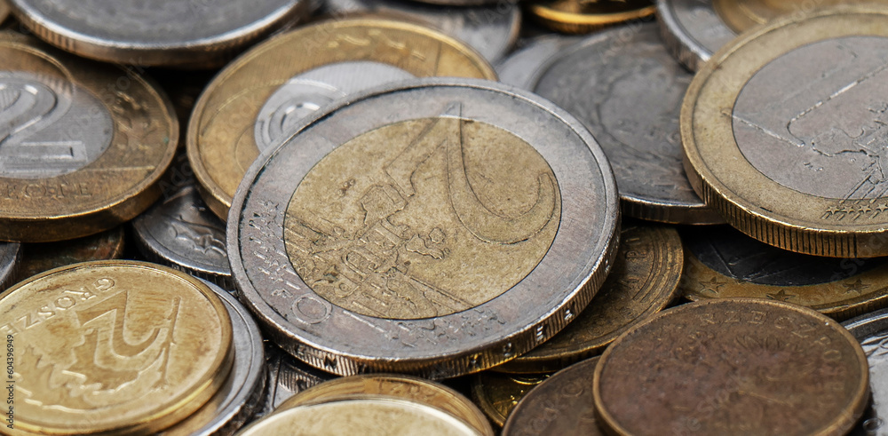 A pile of gold and silver coins. A pile of gold and silver coins.