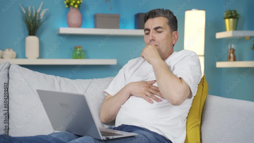 Coughing man.