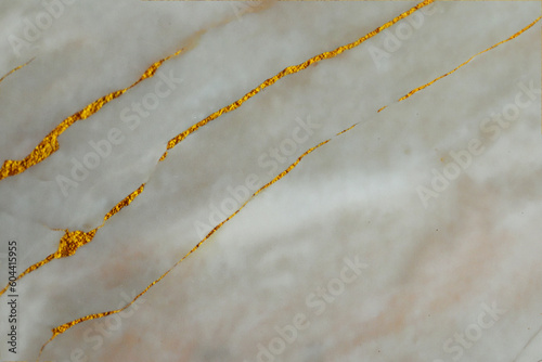 Beautiful gray and gold marble surface as background