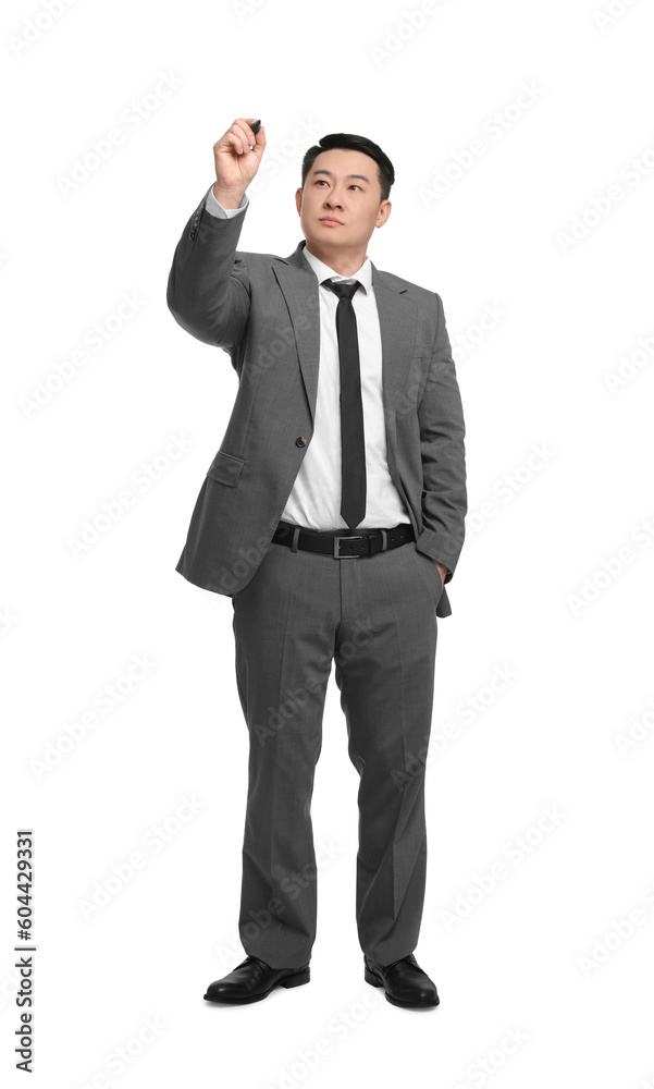 Businessman with marker writing on white background Businessman with marker writing on white background