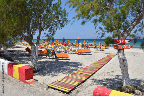 Sun loungers on sandy beach of Marmari. The Greek island of Kos
