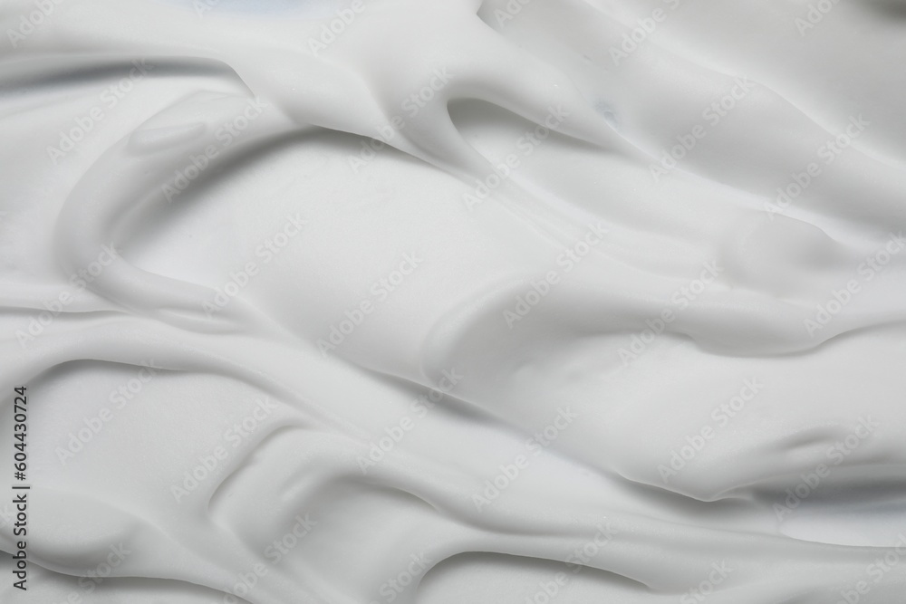 Obraz premium Texture of white shaving foam as background, closeup