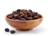 raisins in a wooden bowl isolated on white background 