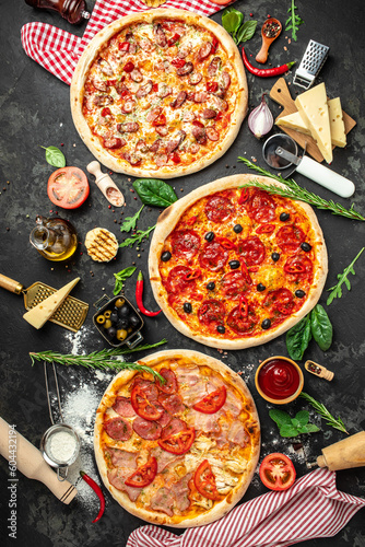 Set Pizza background. various kinds of Italian pizza on a dark background, Fast food lunch, vertical image. top view. place for text
