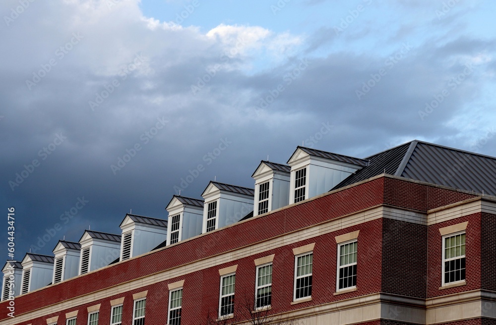 Dormers on College Campus, Exterior View, Dark Clouds in Sky