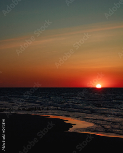 sunset on the beach. baltic sea © TenTamNo