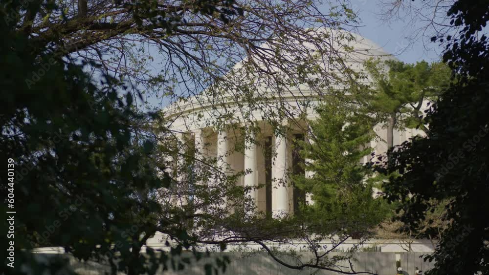 2023 - Exterior of the Jefferson Memorial in Washington D.C., with trees in the foreground. 2023 - Exterior of the Jefferson Memorial in Washington D.C., with trees in the foreground.