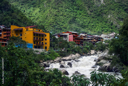 Aguas Calientes is a town in the Urubamba River Valley, in southeast Peru. It’s known for its thermal baths and as a gateway to the nearby Inca ruins of Machu Picchu. photo