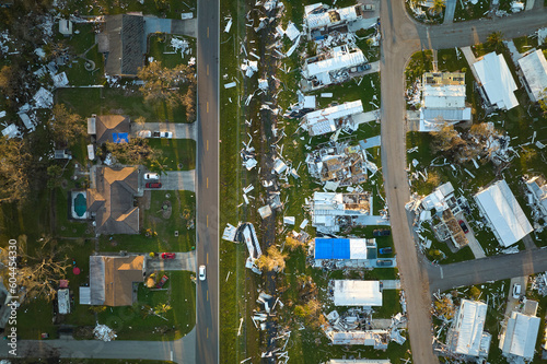 Destroyed by hurricane Ian suburban houses in Florida mobile home residential area. Consequences of natural disaster
