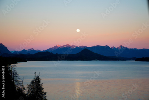 landscape of full moon in a morning in the lake in patagonia © Romina