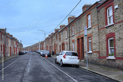 Fototapeta Naklejka Na Ścianę i Meble -  Long street of identical small row houses