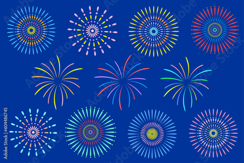 Set illustration of colorful fireworks on navy blue background.