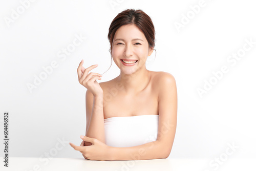 Beautiful young asian woman with clean fresh skin on white background, Face care, Facial treatment, Cosmetology, beauty and spa, Asian women portrait.