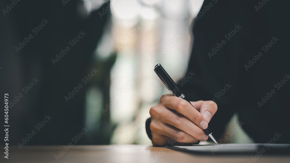 Learning ideas in the conference room business report document Businessman manager writing at company on table to read Sign documents or document files. contract document concept Learning ideas in the conference room business report document Businessman manager writing at company on table to read Sign documents or document files. contract document concept