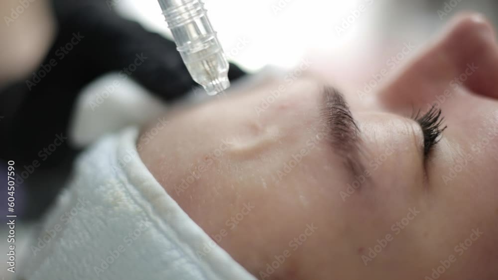 Girl getting oxygen face therapy in a beauty salon. Professional skin care treatment. The unique technology of non-injection oxygen mesotherapy, innovative technique without any painful sensations.