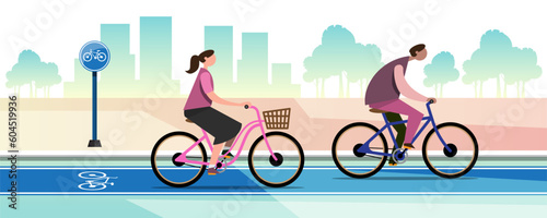 Two happy families riding on bicycles in Bike lane for relaxation. Traffic lanes have bicycle lanes for people to use.