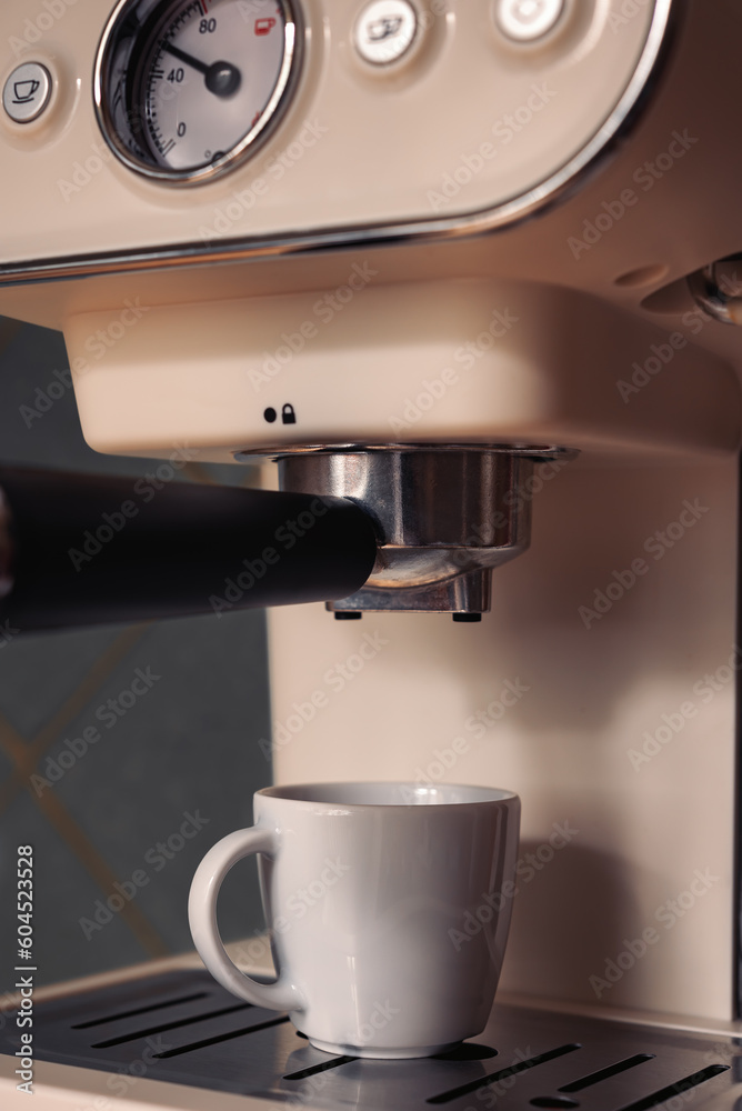 Espresso machine brewing a coffee Espresso machine brewing a coffee