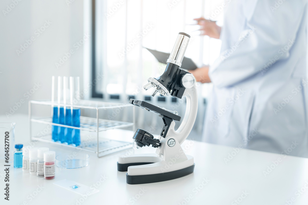 Scientist woman standing to reading result coronavirus vaccine o