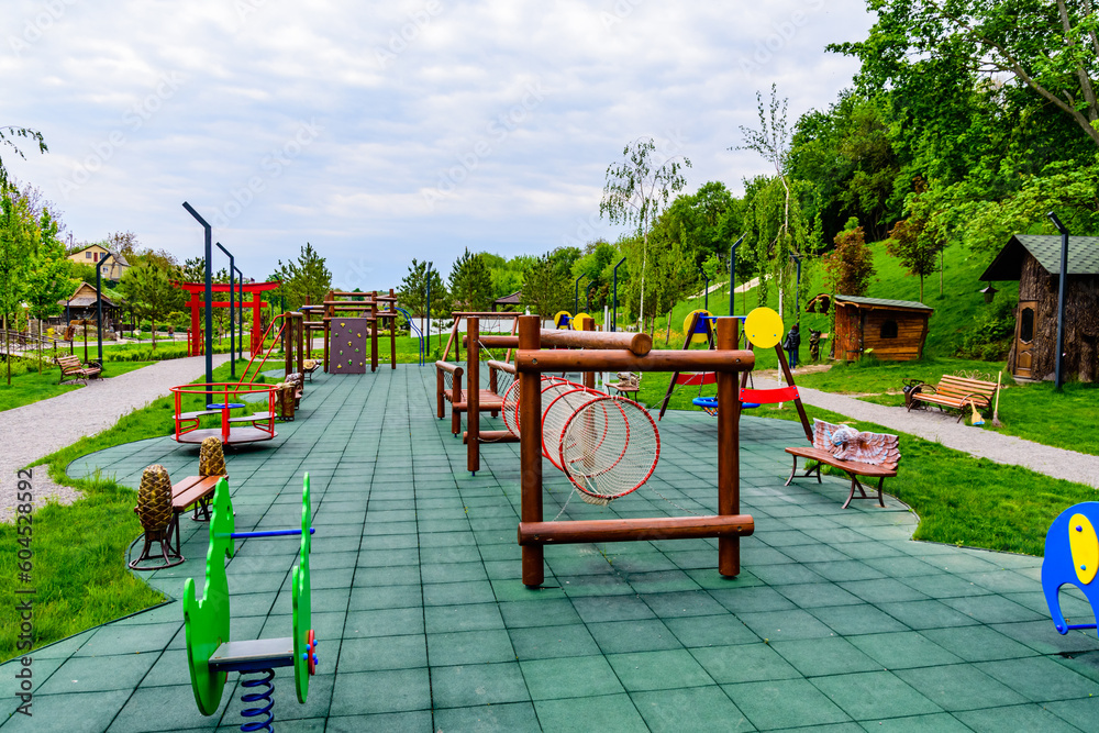 Different equipment on children playground in a city park Different equipment on children playground in a city park