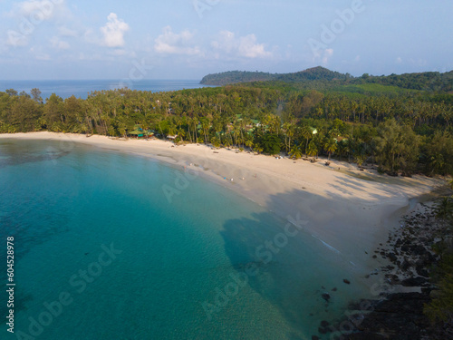 Fototapeta Naklejka Na Ścianę i Meble -  Aerial drone view of beautiful beach with turquoise sea water and palm trees of Gulf of Thailand. Kood island, Thailand.