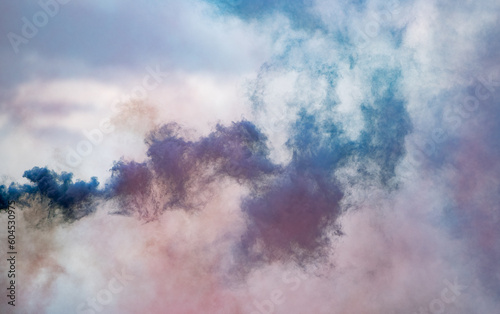 Dense multicolour colourful background from smoke. Pink red, blue and white.. Minimal abstract background for presentation