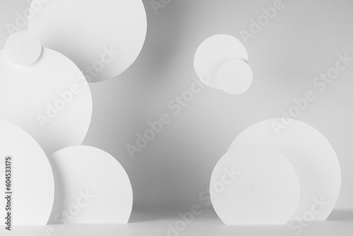White soft light abstract stage with pattern of circles fly as decor in urban geometric style, scene template for presentation cosmetic products, goods, design, advertisement, card.