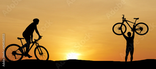 Silhouette of a happy mountain biker in the evening. Exercise and hobby ideas