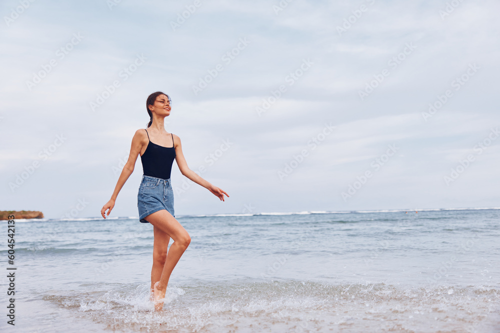 woman sea summer lifestyle travel beach smile sunset positive young running