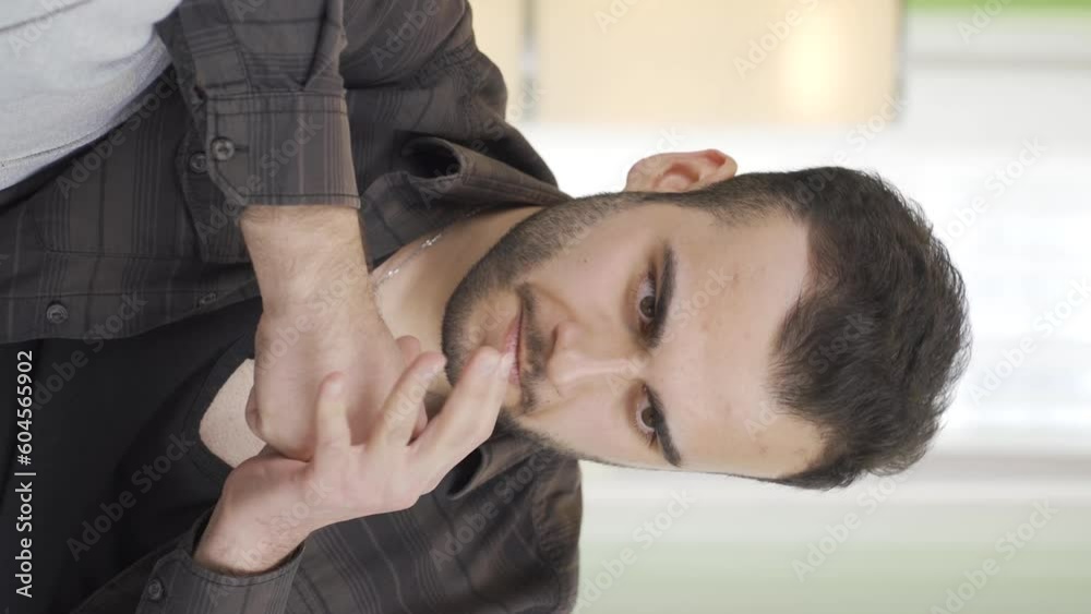 Vertical Video of Angry neurotic and psychopath man. Vertical Video of Angry neurotic and psychopath man.