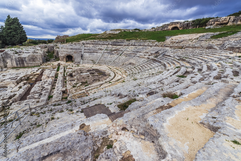 Ruins of Greek Theater in Neapolis archaeological park of Syracuse city, Sicily Island in Italy