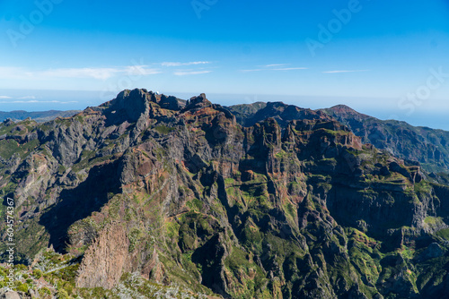 Beautiful hiking trail from Pico do Arieiro to Pico Ruivo  Madeira island. Footpath PR1 - Vereda do Areeiro. On summy summer day above the clouds. Portugal.