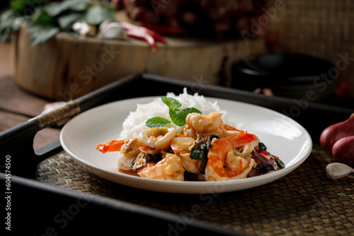 Thai food, stir-fried basil, stir-fried basil with shrimp and squid, popular Thai food. popular Thai food concept, spicy food
