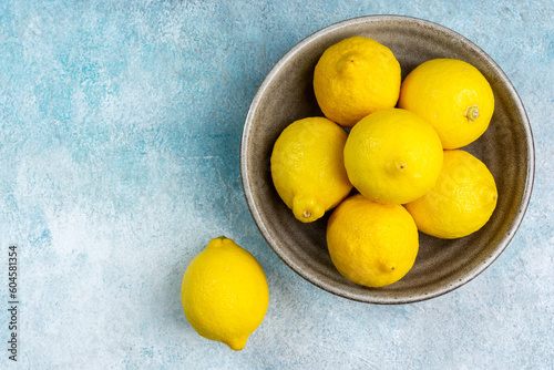 whole yellow lemons isolated on bright background. Lemons citrus fruit, healthy, summer. Copy space
