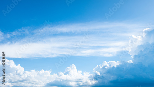 Beautiful blue clear sky with white cloud and sunshine background. © ant